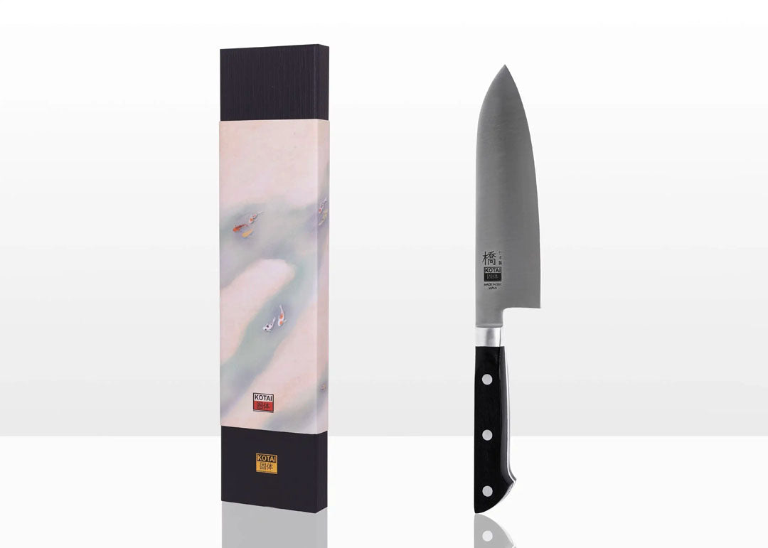KOTAI Hashi Santoku met 17 cm lemmet naast doos