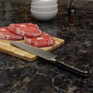 giesser bestcut koksmes 20 cm op tafelblad snijplank met vlees